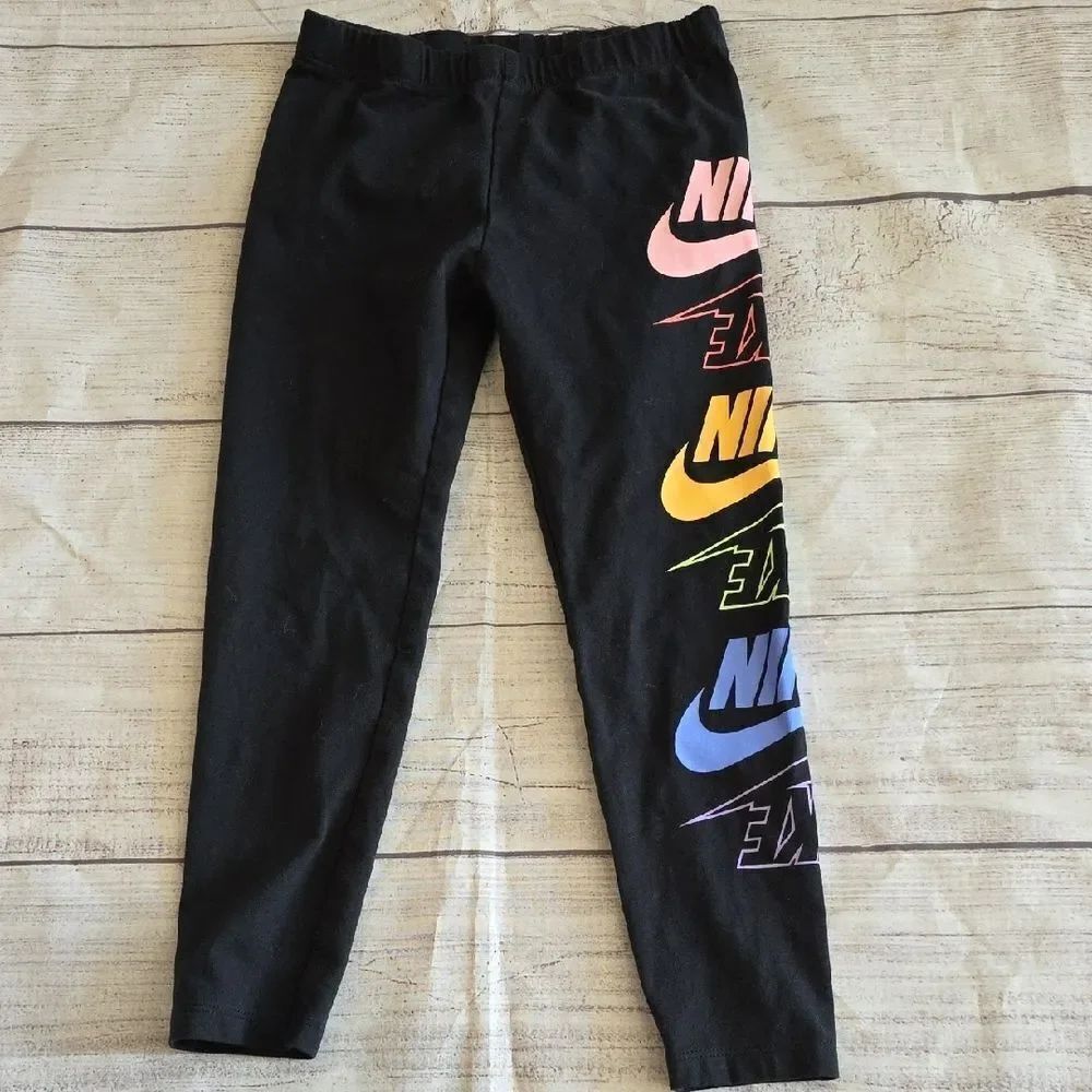 Nike Black and Pink Leggings with Bold Logo Design